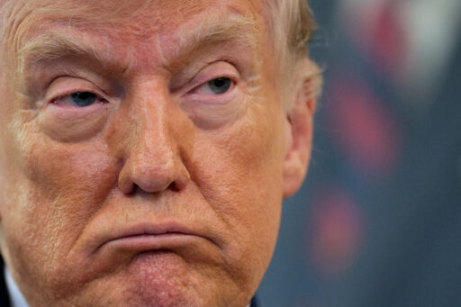 Donald Trump e delegação americana