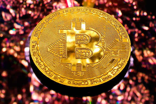 Interface do aplicativo Mynt mostrando a alocação entre ouro e Bitcoin.