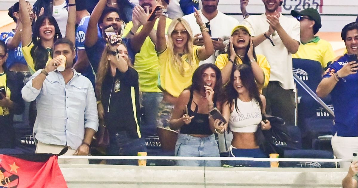 Virginia Fonseca e Vini Jr em evento esportivo.